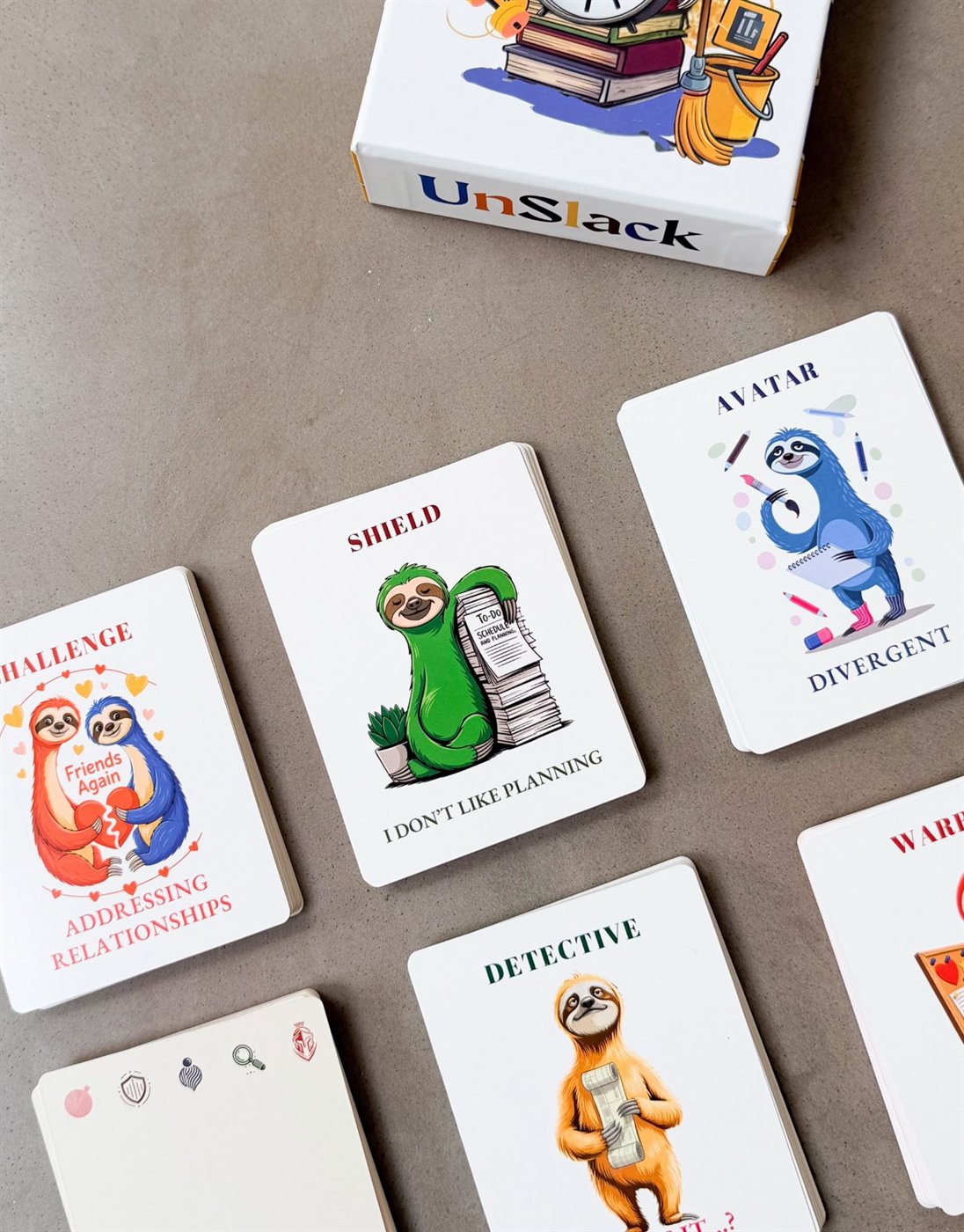 Unslack cards spread out showing Challenge, Shield, Avatar, Detective and Warrior cards